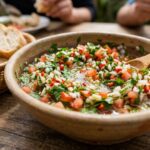 Chilean Pebre Sauce A vibrant and fresh Chilean condiment, pebre is perfect for spooning over grilled meats, empanadas, or simply enjoying with bread. This zesty salsa is packed with flavor from fresh tomatoes, cilantro, and garlic.